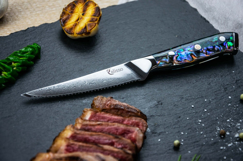 Calisso Abalone Steakmesser mit Steak, Chili und gegrilltem Knoblauch